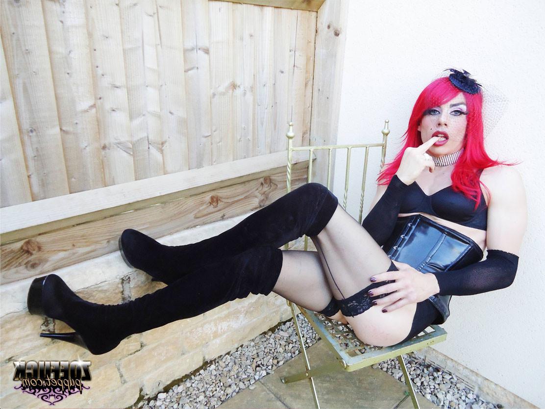 15P Gorgeous red head Zoe plays with her huge cock