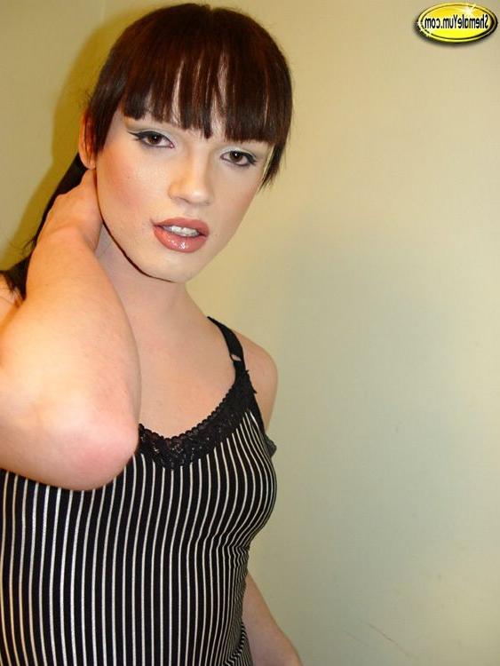 15P Beautiful brunette shemale babe with a huge cock