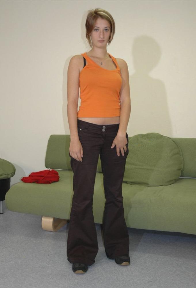 25P Embarrassed Naked Female - Slave strips completely naked