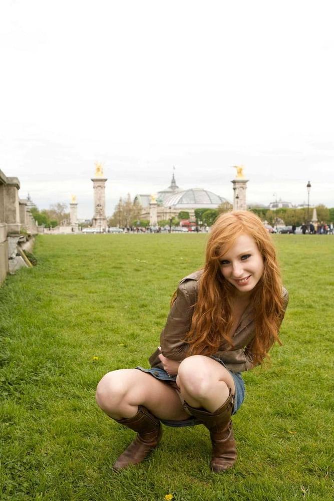25P Hot slim redhead webslut loves exposing herself