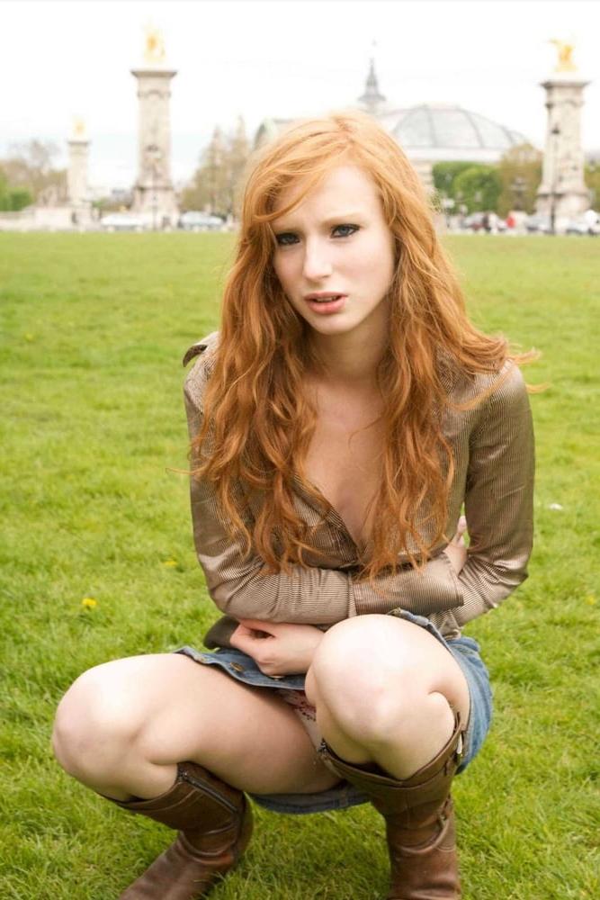 25P Hot slim redhead webslut loves exposing herself