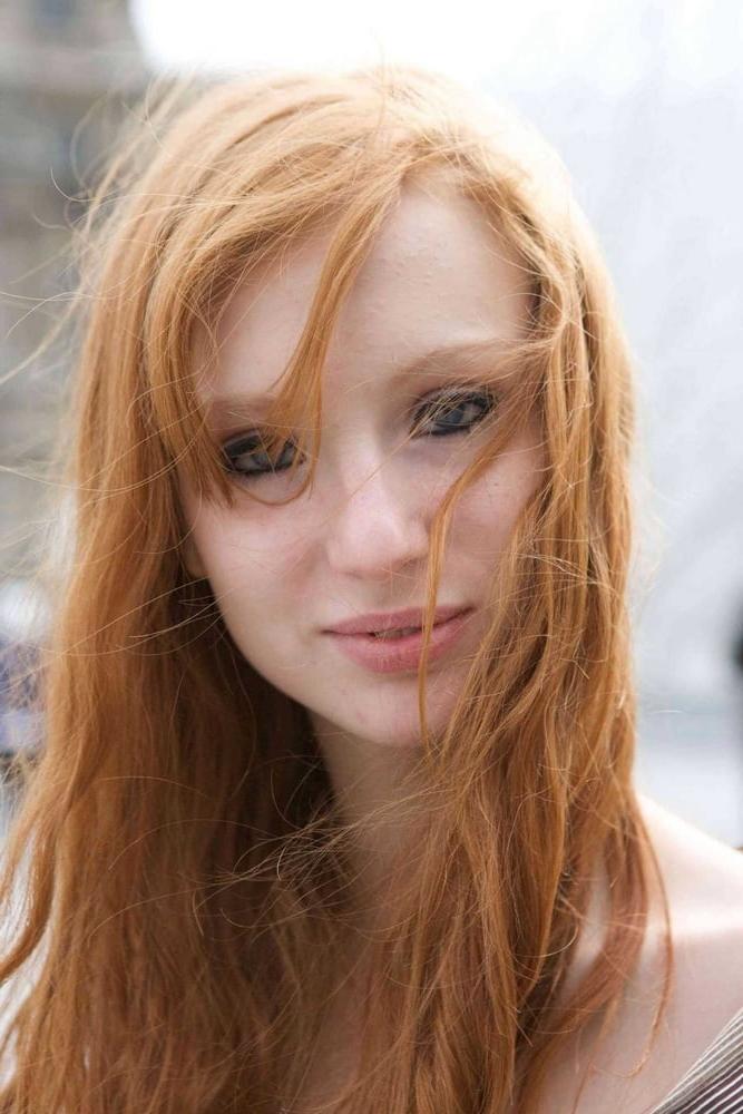 25P Hot slim redhead webslut loves exposing herself