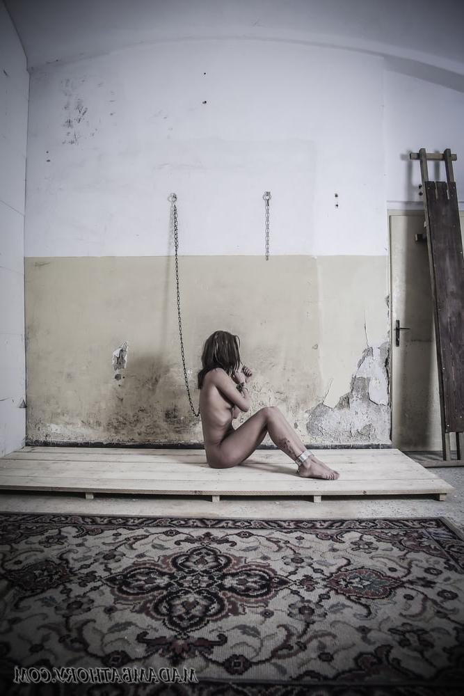 25P Shackled white slave